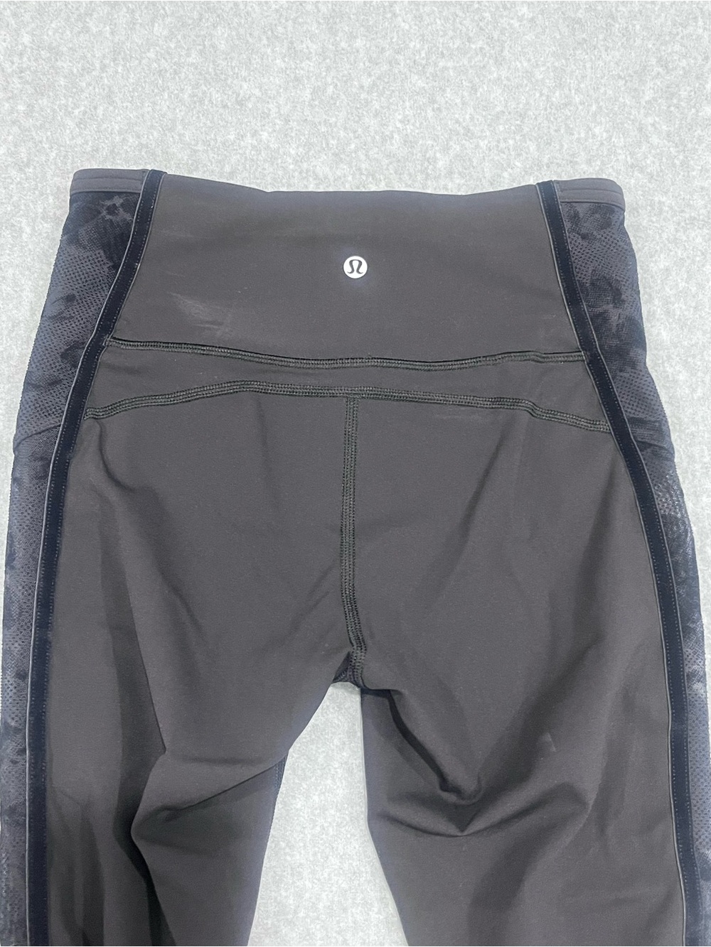 Lululemon Black Capri Leggings With Floral Mesh Detail and Side Pockets Size 6